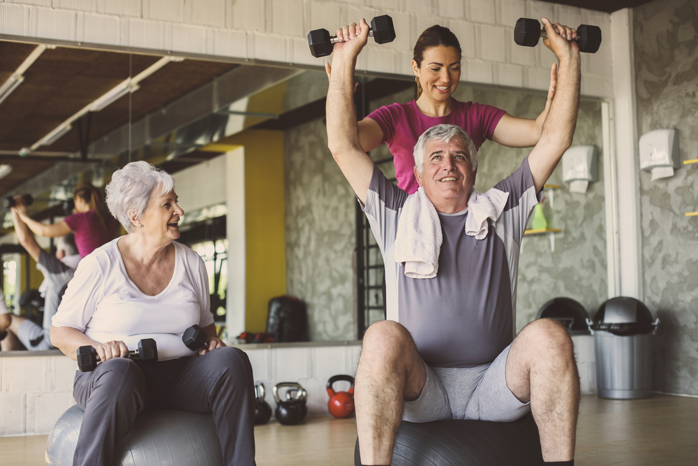 Group of seniors doing strength training exercises